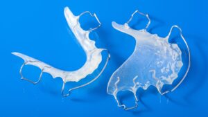Invisalign clear aligners — each set custom-made for your treatment plan